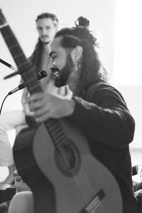 Free stock photo of arab man, audio equipment, guitar Stock Photo